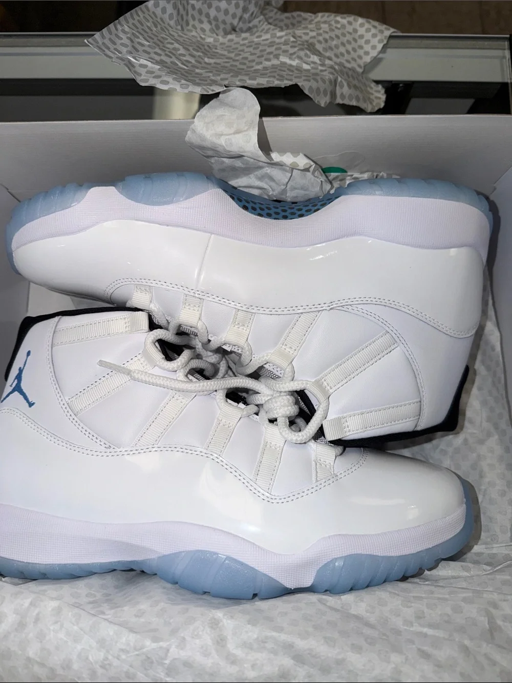 Jordan 11 Legend Blues Sneakers in White with Light Blue Accents
